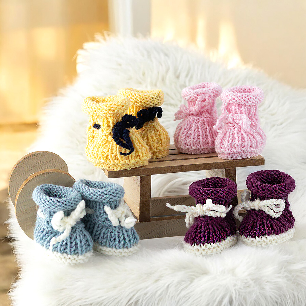Puppenschuhe mit Rollrand gestrickt aus Wolle