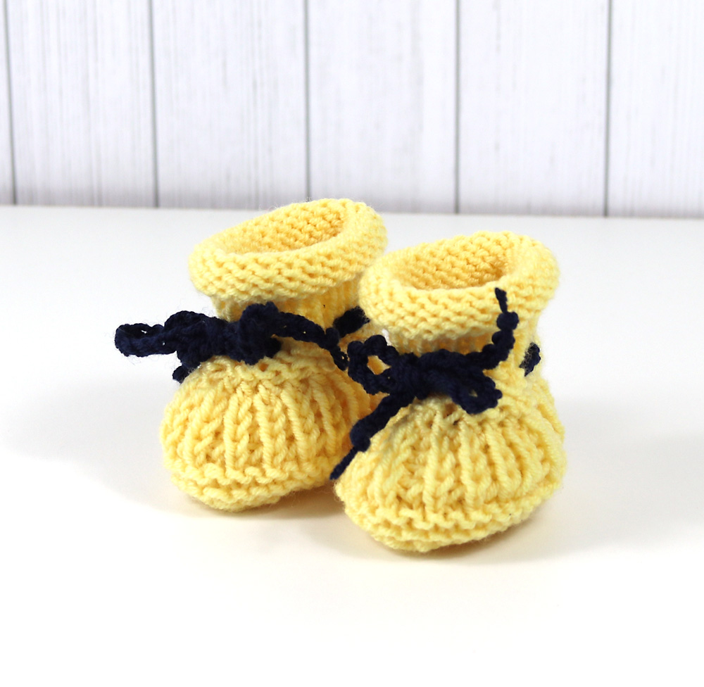 Puppenschuhe mit Rollrand in gelb