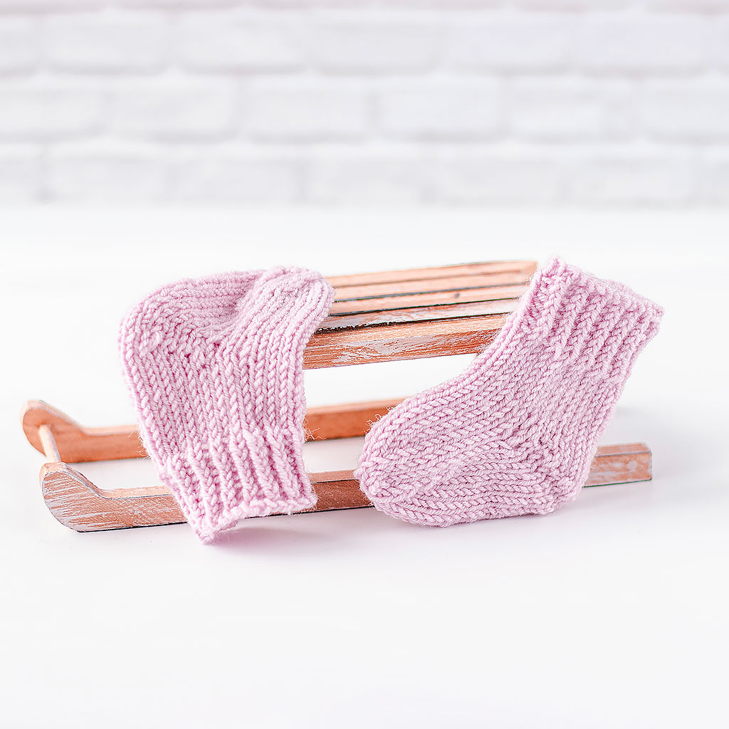 Puppensocken aus Wolle flieder