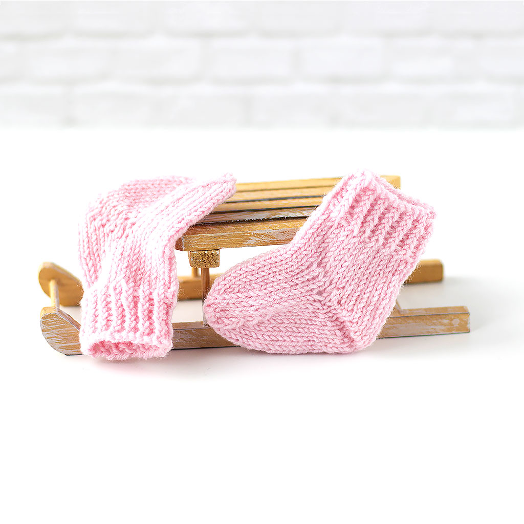Puppensocken aus Wolle rosa