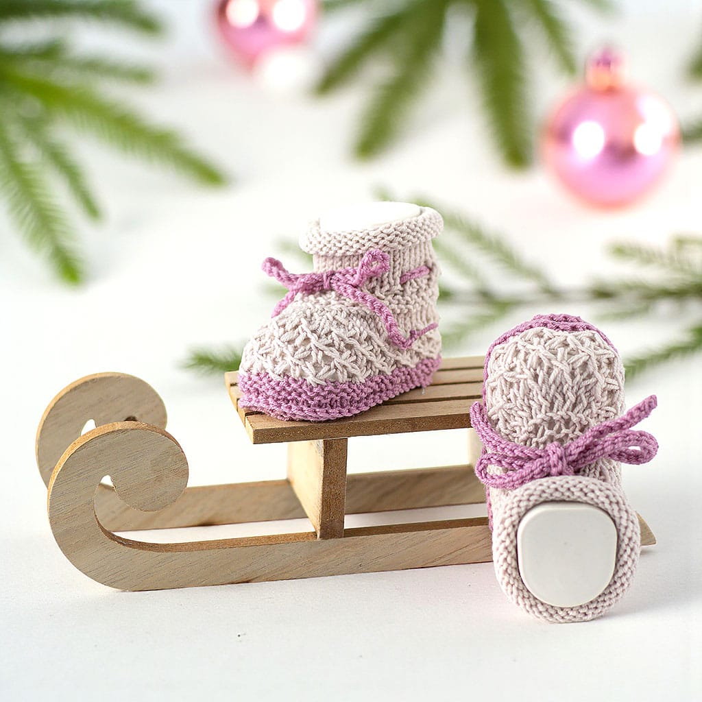 Babyschuhe in Rosa und Beere gestrickt